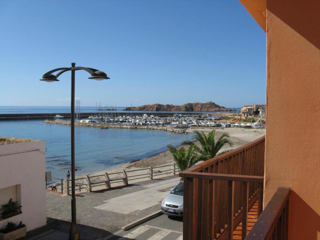 Borgo Spiaggia Vista Mare Isola Rossa Cameră foto