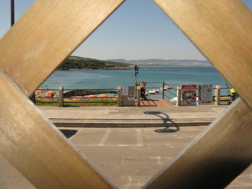 Borgo Spiaggia Vista Mare Isola Rossa Cameră foto